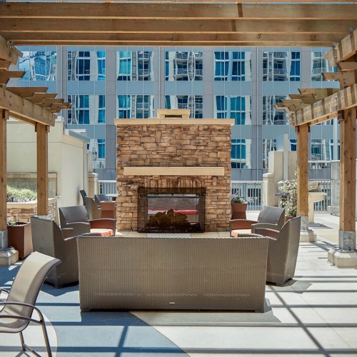 Outdoor Fireplace outdoor fire place with seating under pergola