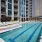 outdoor swimming pool surrounded by lounge chairs