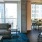 open living room with access to private balcony