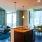 open concept apartment layout with ample natural light from floor-to-ceiling windows